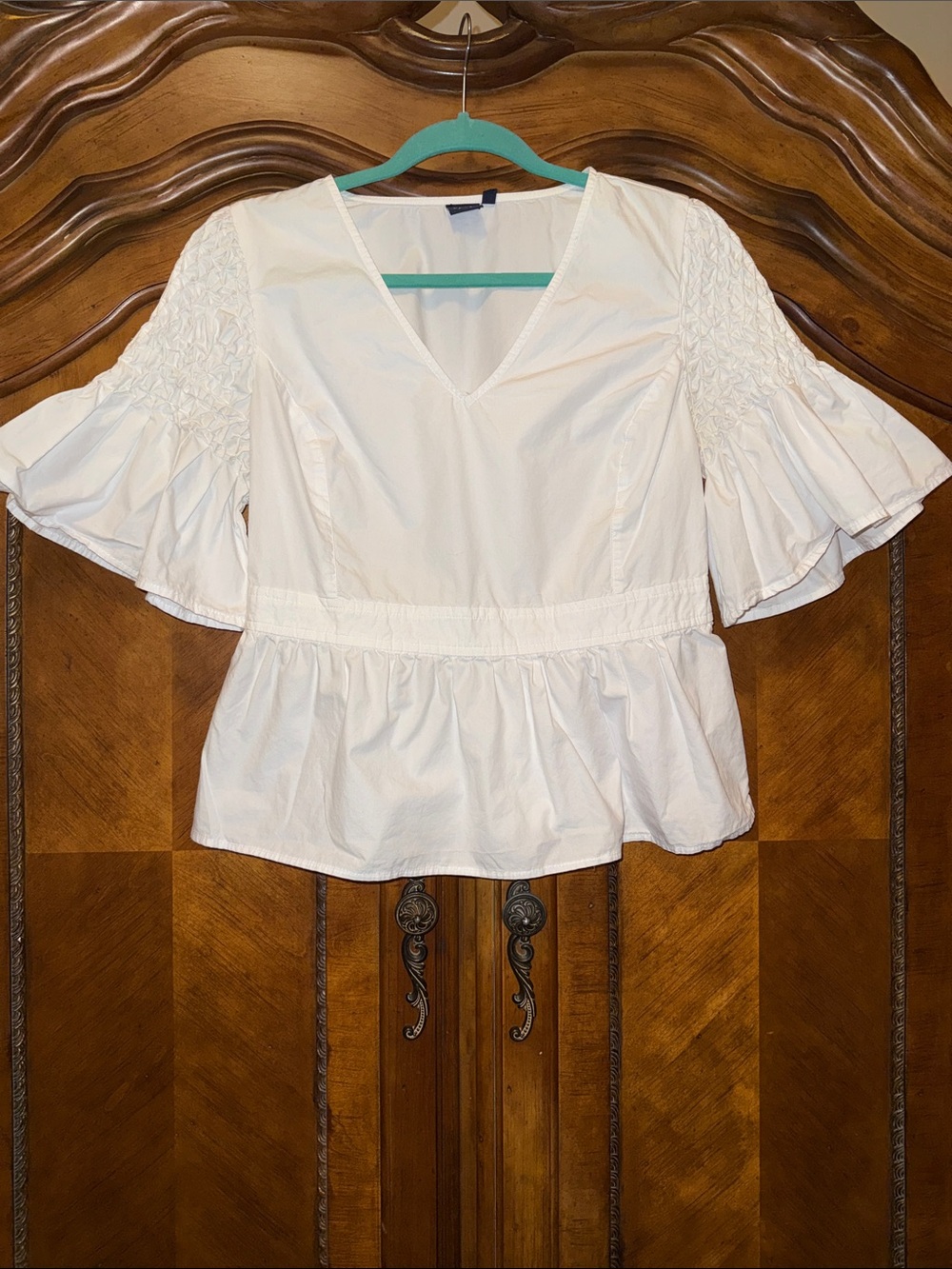 Kaari Blue White V-Neck Peplum Blouse with Smocked Bell Sleeves